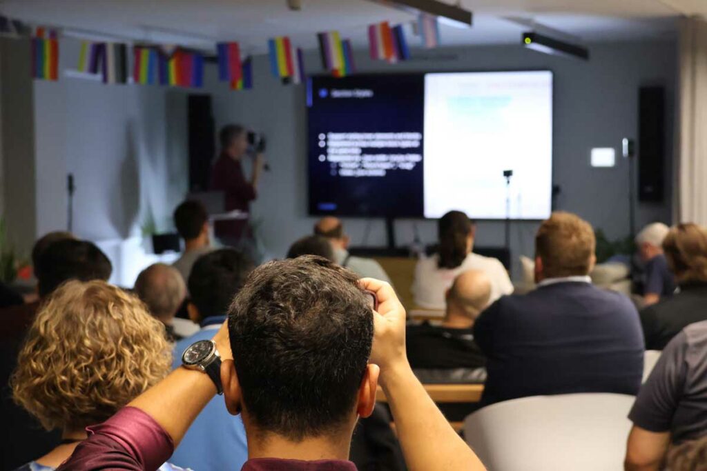 JuanMa Garrido presenting at #WPLDN in front of an audience. 